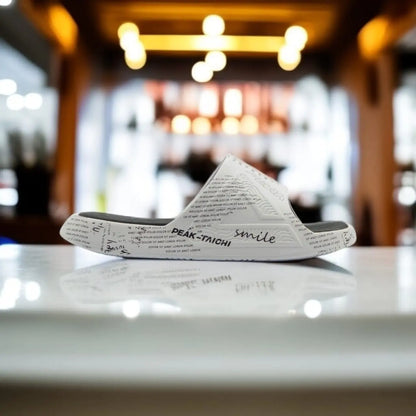 E11937L	SLIPPERS  WHITE/BLACK - 213.PEAK