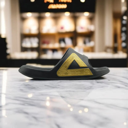 E92037L	SLIPPERS     BLACK/GOLD - 213.PEAK