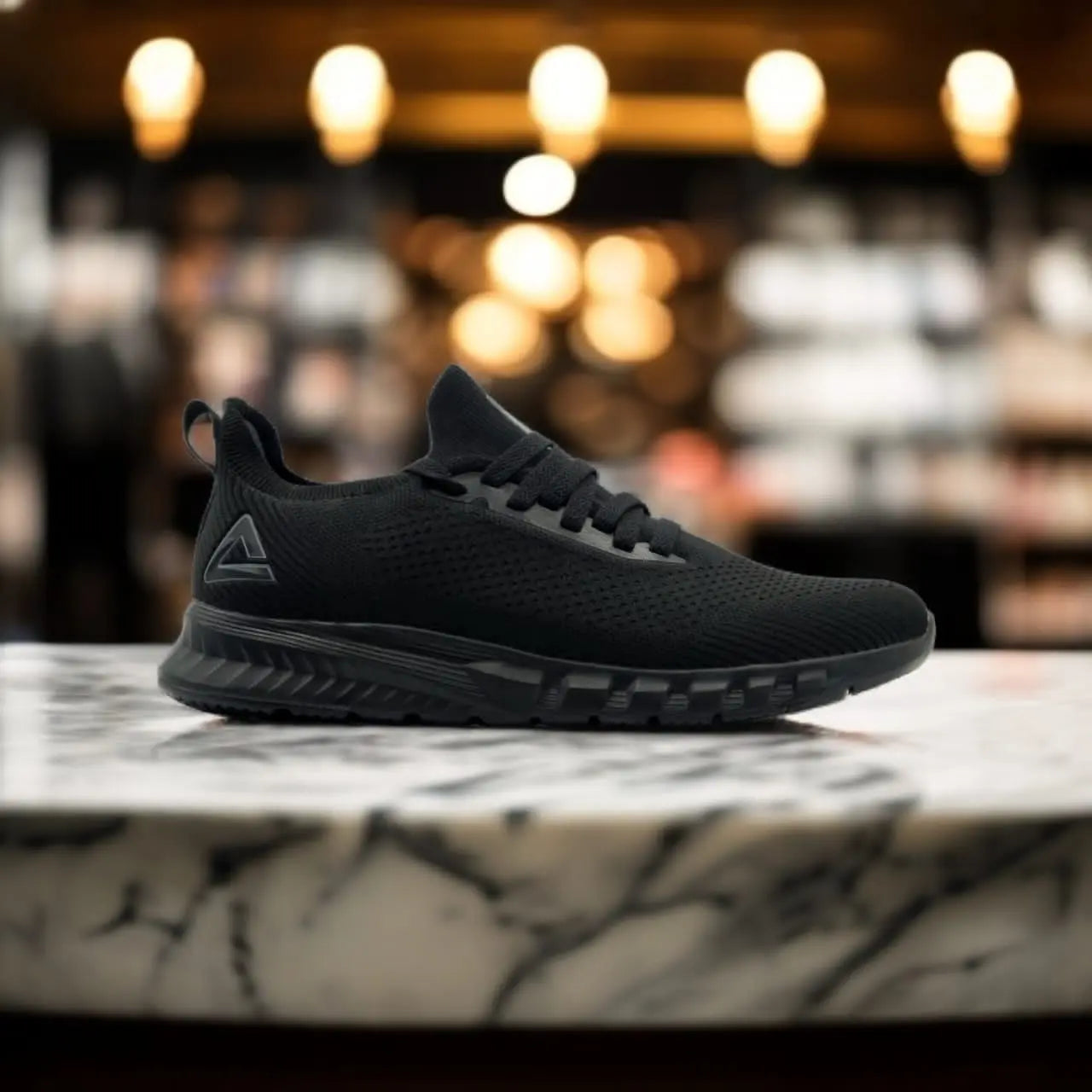 E29007H	Sports Shoes	 ALL BLACK - 213.PEAK